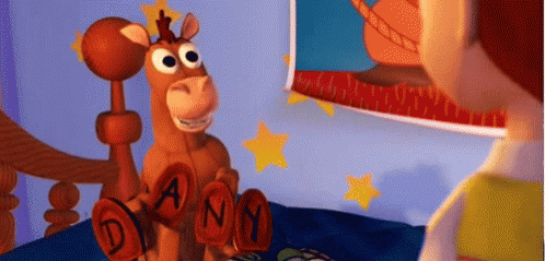 Toy Story Character Beside Stuffed Animal Dany