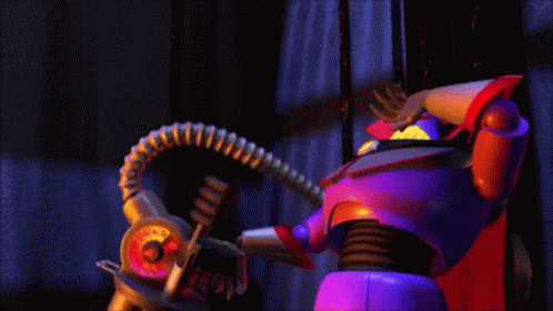 Toy Story Character Holding Large Gun GIF