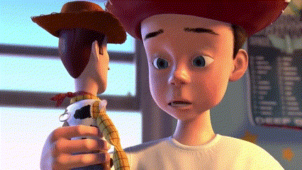 Toy Story Character Holding Woody Doll