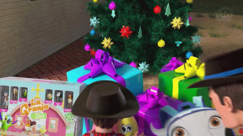 Toy Story Characters Are Standing In Front Of A Christmas Tree And Presents GIF
