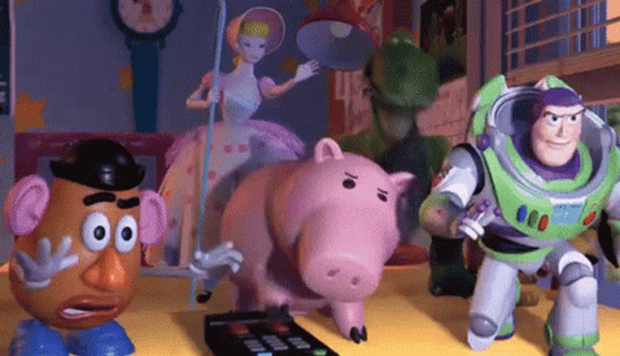 Toy Story Hamm Pressing Remote GIF