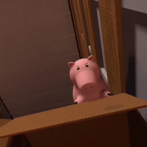 Toys In A Box On Floor GIF