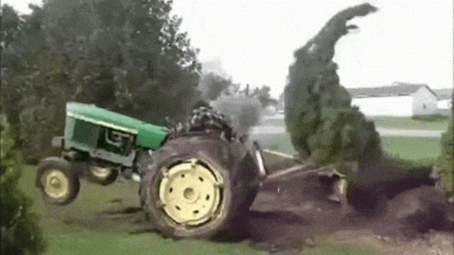 Tractor Pulling Pine Tree GIF