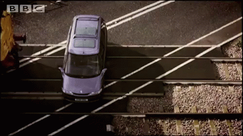 Train Crash Into A Car While Parking GIF