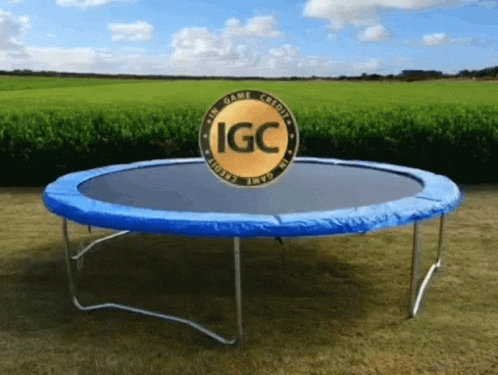 Trampoline With Blue Cover and Gold IGC Logo