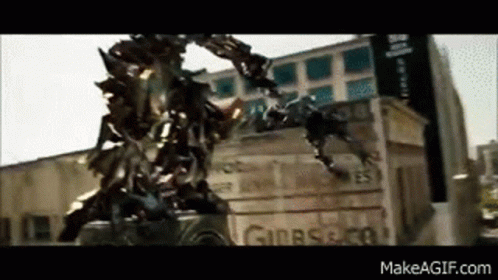 Transformer Standing By City Building GIF