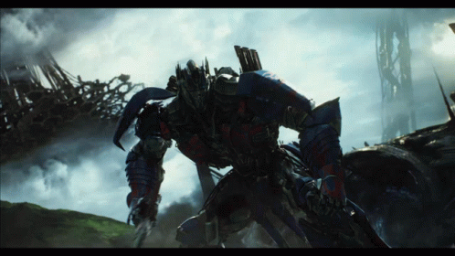 Transformer With Sword Standing in Field