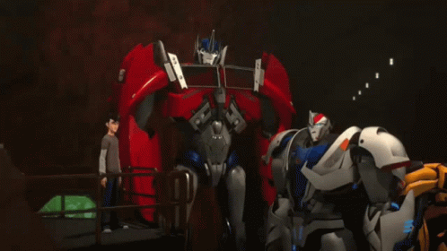 Transformers Standing in Dark Room