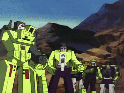 Transformers Standing Together With Letter C