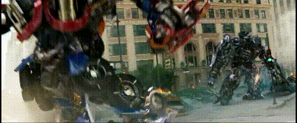 Transformers Walking Down Street