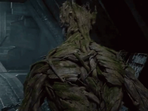 Tree Trunk Face Statue