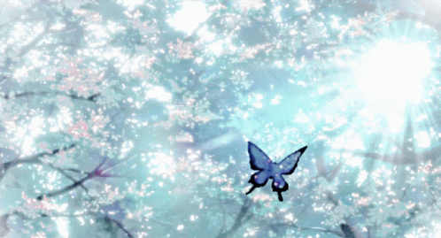 Tree With Flowers And Sun Shining Through GIF