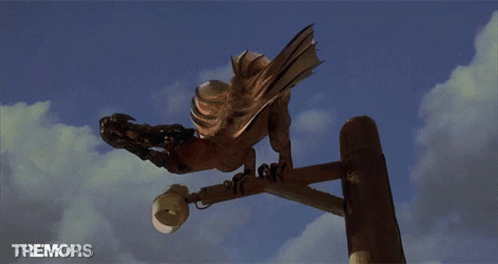 Tremors Ass Blaster Resting On Power Line GIF