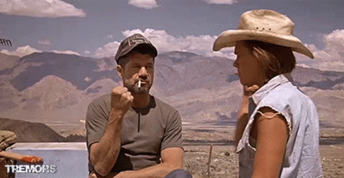 Tremors Earl And Valentine Playing Rock Paper Scissors GIF