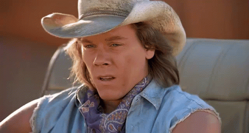 Tremors Valentine Mckee Shooing Away Insects GIF