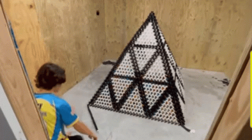 Triangular Black White Dominos Falling GIF