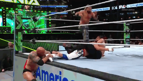 Tribal Chief Got Stomp By Seth Rollins GIF