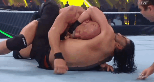 Tribal Chief Roman Fight And Hold Enemy Head GIF