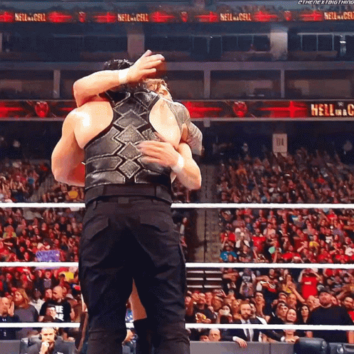 Tribal Chief Roman Reign Hugs Enemy Wwe Fight GIF