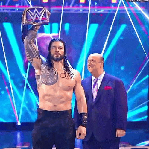 Tribal Chief Roman Reign Wins Match Raise Belt GIF