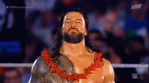 Tribal Chief Roman Reign Wins Wwe Holding Two Belt GIF