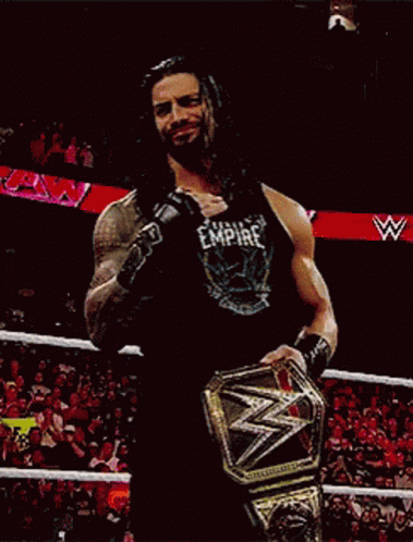 Tribal Chief Roman Reigns Making Get Out Hand Sign GIF