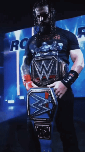 Tribal Chief Roman Reigns Wins Wwe Holding Belt GIF