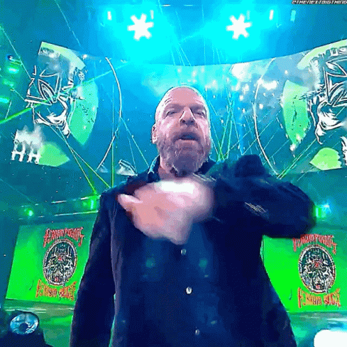 Triple H Arena Entrance Cut Throat Gesture GIF