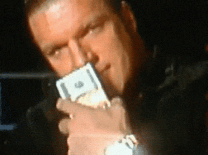Triple H Sniffing Money Sinister Smile GIF