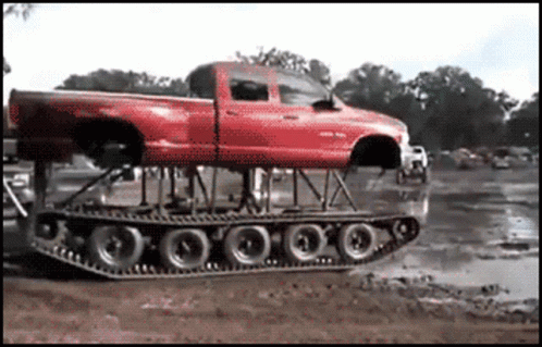 Ram Pick Up Truck Plowing Mud GIF