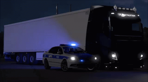 Truck Beside Police Car With Blue Lights GIF