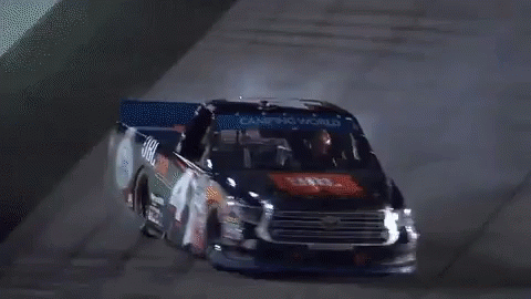 Truck Drifting on Track With Tire Smoke