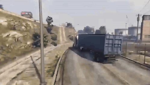 Truck Driving Down Road With Billboard