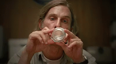 True Detective Rustin Cohle Looking At Crushed Can GIF