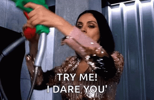 Try Me Mila Kunis Aiming Guns GIF