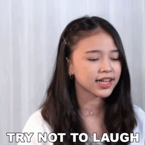 Trying Not To Laugh GIF