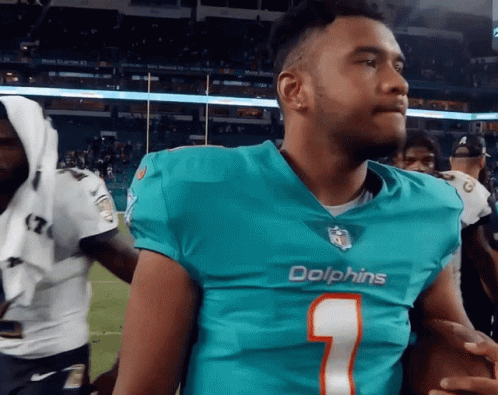 Tua Tagovailoa Hugging Opponent GIF