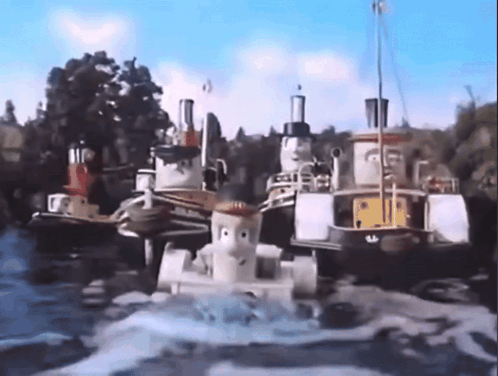 Tug Boats Floating On A River GIF