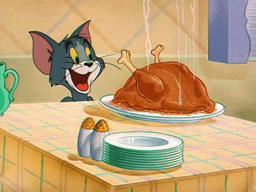 Turkey Day Tom Cat Looking At Cooked Bird GIF