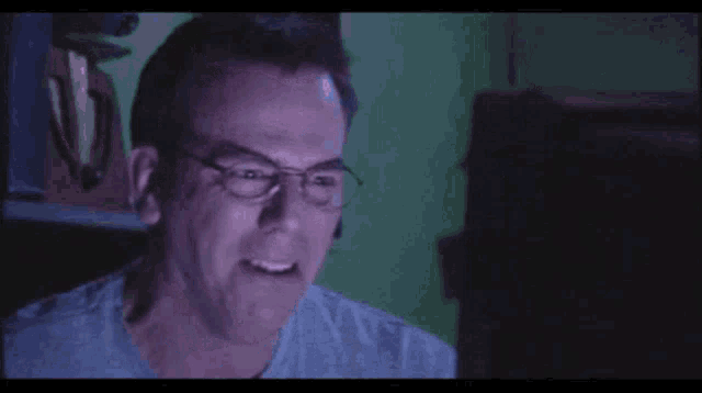 Turning Off Laptop Laughing Then Crying GIF