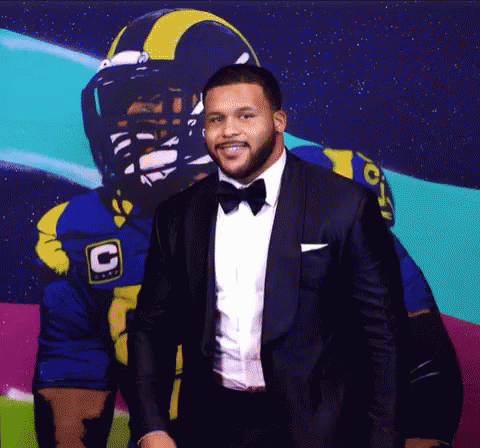 Tuxedo Man and Football Player with C Helmet