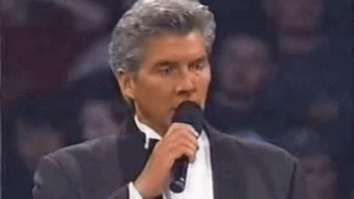 Tuxedo Man Singing Let's Get Ready To GIF