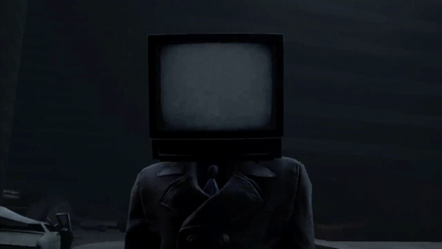 Tv Man Smiley Face Standing In The Dark GIF