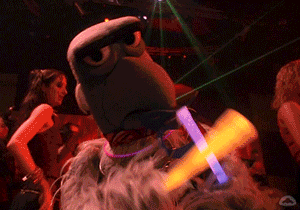 Tweaker Guy On Bird Mascot Shaking Light Stick GIF