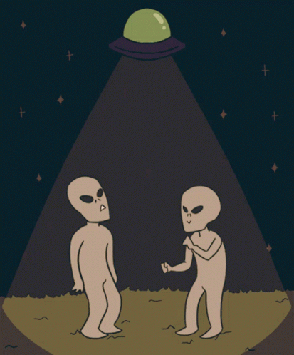 Two Aliens Standing in Front of Green Object