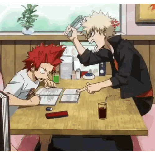 two anime characters are sitting at a table and one of them is holding a gun .