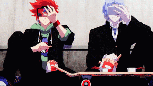 Two Anime Characters Are Sitting On Skateboards And One Is Taking A Picture Of Himself GIF