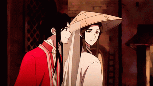 Two Anime Characters Are Standing Next To Each Other GIF