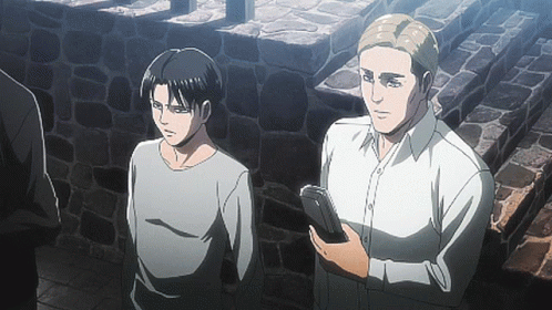 Two Anime Characters Are Standing Next To Each Other And One Is Holding A Book GIF