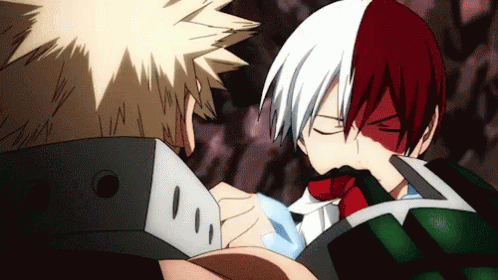 Two Anime Characters , Bakugo And Todoroki , Are Standing Next To Each Other And Looking At Each Other . GIF